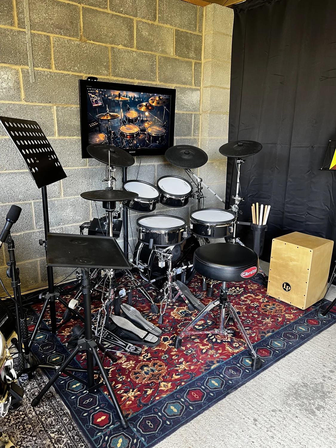 Three-quarter view of the electronic drum kit and percussion in Oscar’s current studio